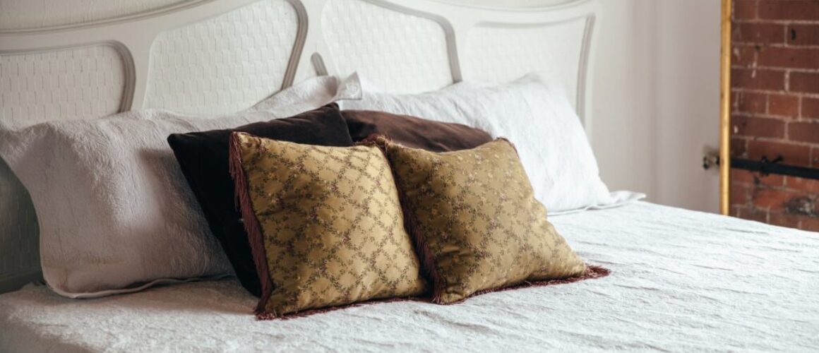 Bedroom Bed With Brown Throw Pillows